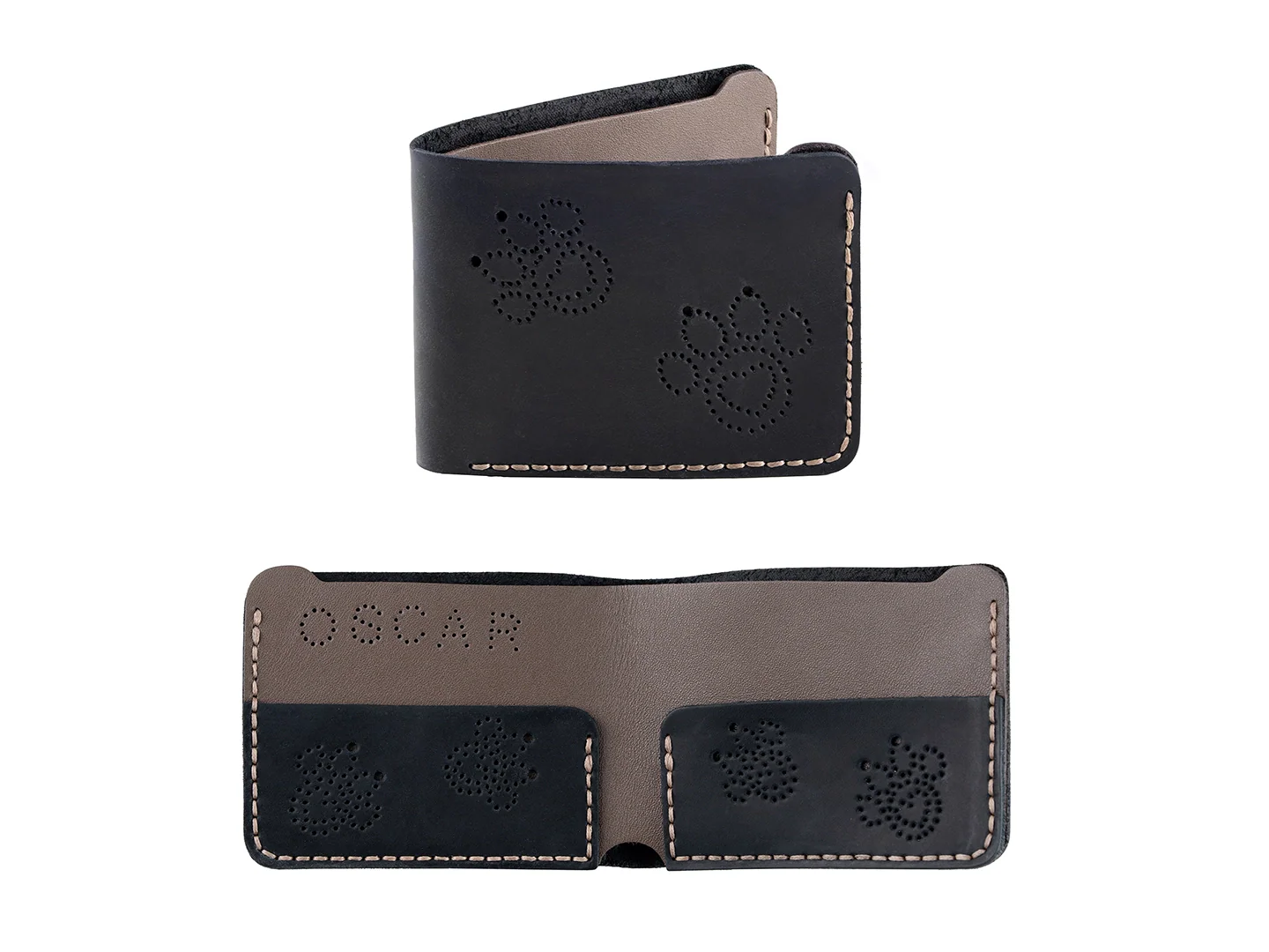 Two black leather wallets with paw prints on a white background