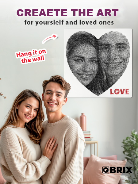 Couple with a heart-shaped art piece of their faces and the word 'LOVE' in a room.