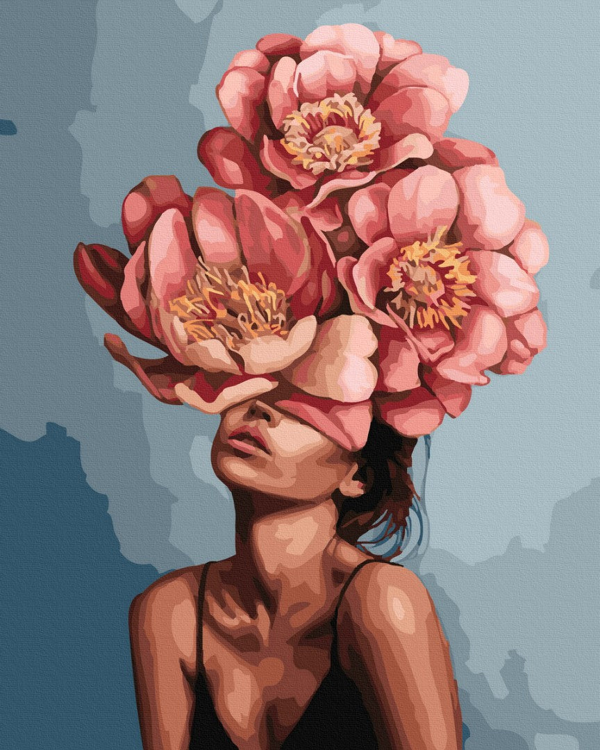 Girl in blooming peonies